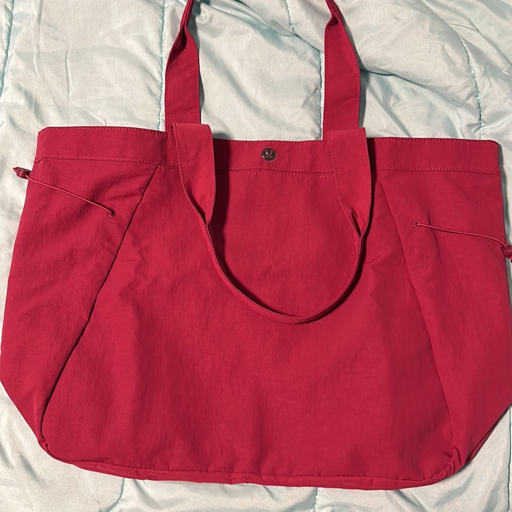 Lululemon Side-Cinch Bag in Hot Pink